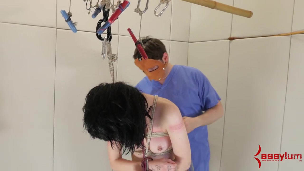 Bdsm slut gagging on strapon dick