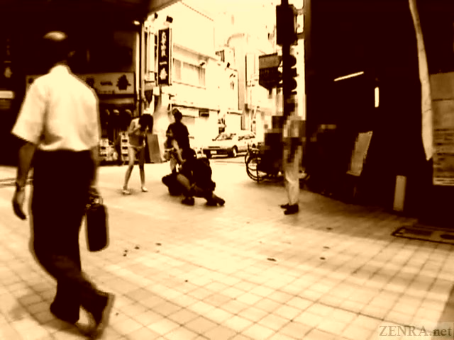 Subtitled extreme Japanese public nudity striptease in Tokyo