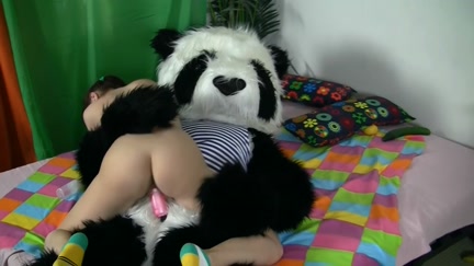 Chic brunette hair angel seducing Panda bear