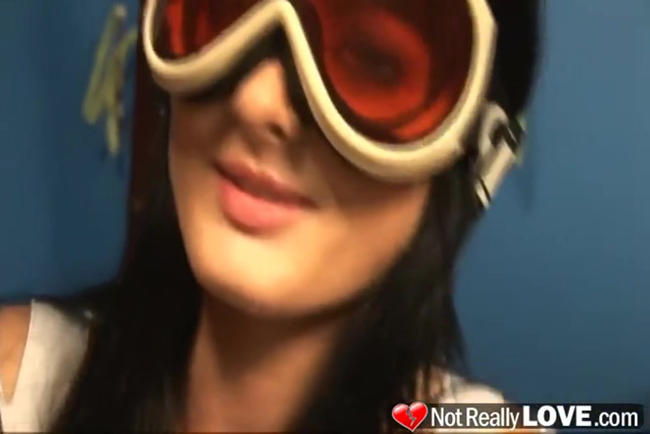 Brunette girl with sky glasses strokes two big dicks