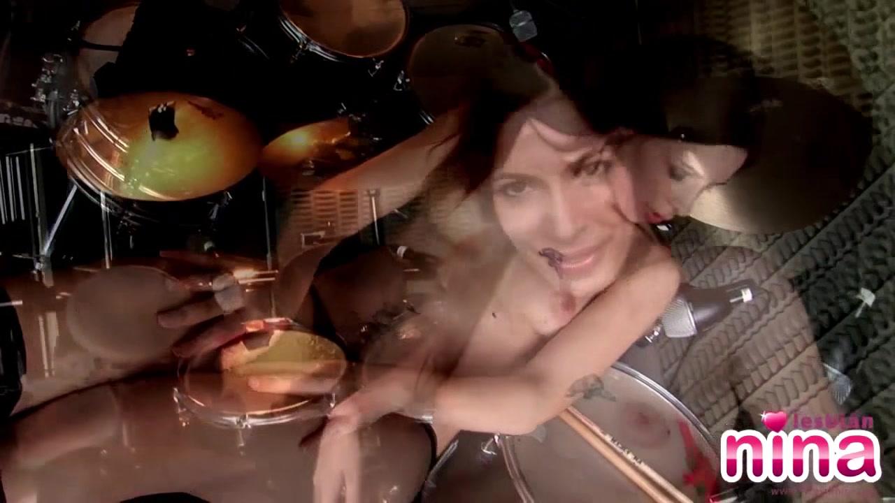 Lesbian Nina with drums showing her perfect body