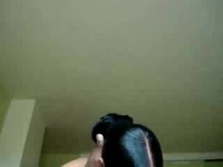 Dark-skinned cock sucker doing her job very well
