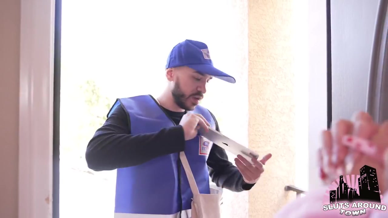 Mailman Delivers A Big Package To