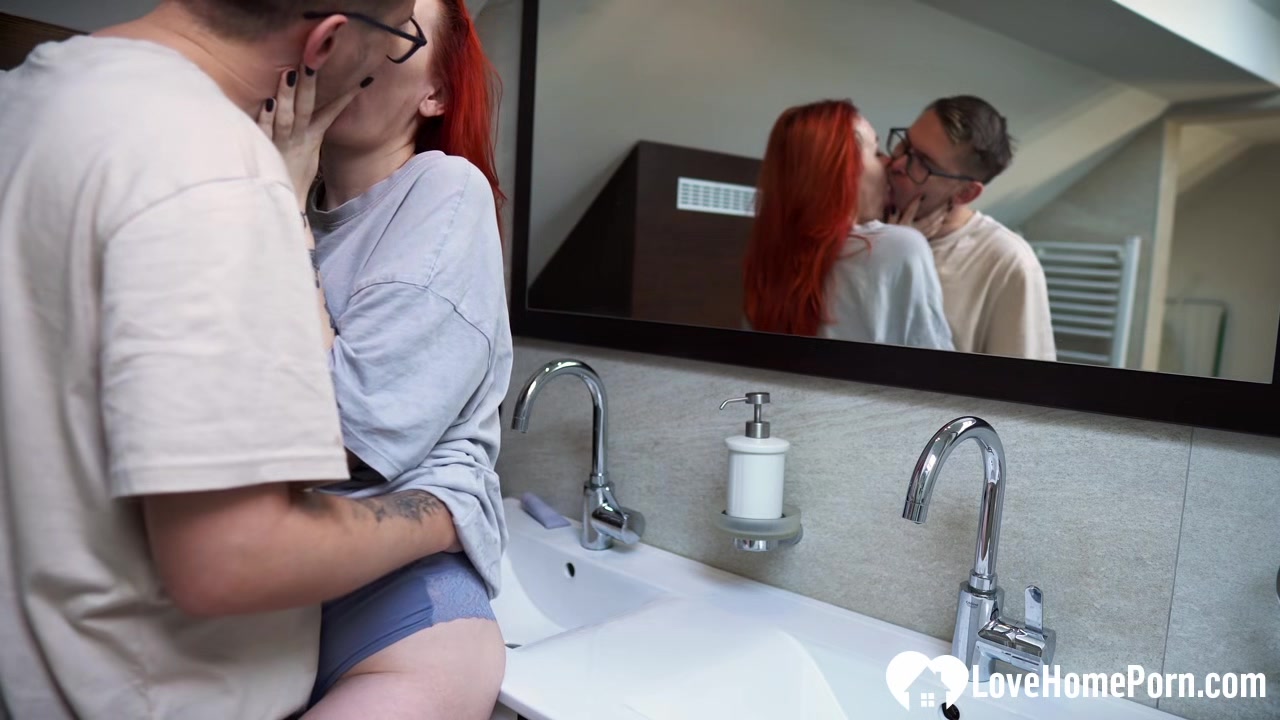 Drilling a horny redhead roommate in the shower