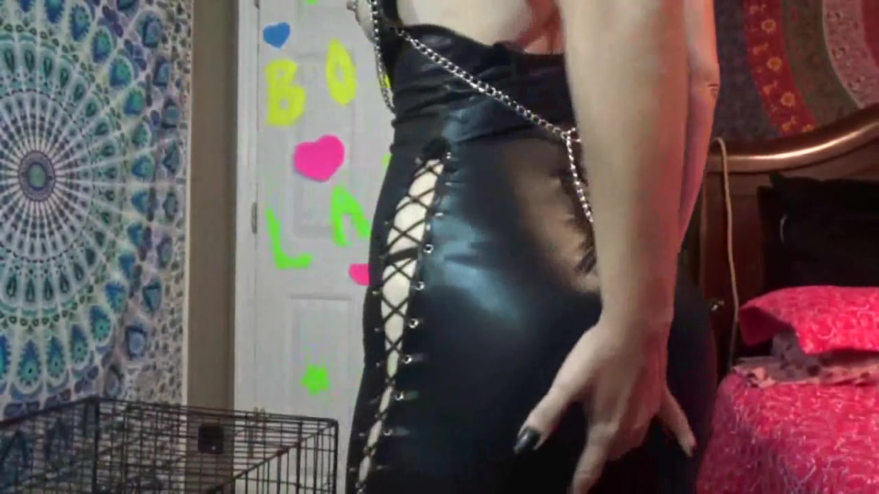 Solo mistress wearing latex shows her tits while talking dirty by Femdom Austria