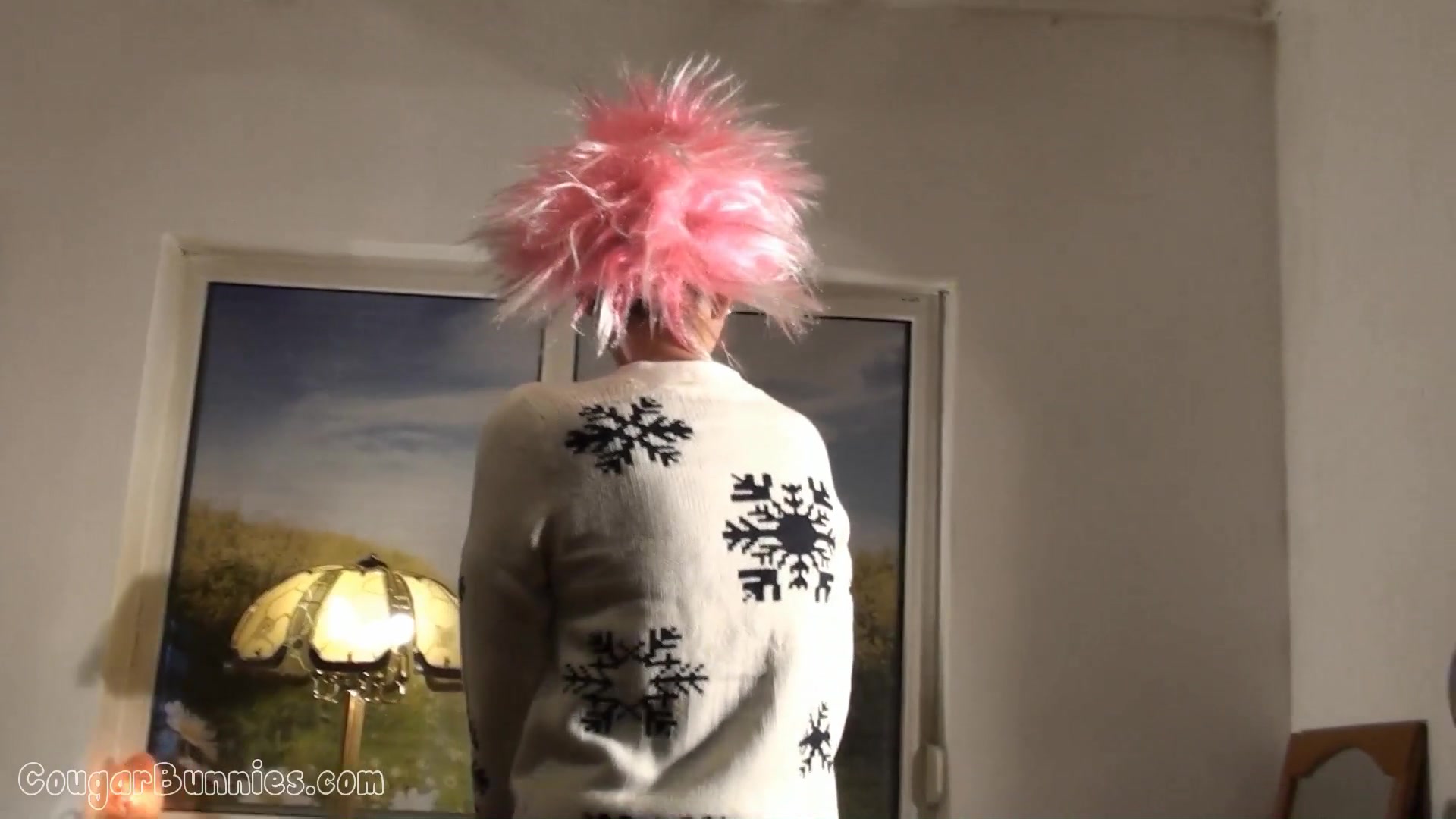 Doris Dawn with funny pink hair demonstrates her pussy