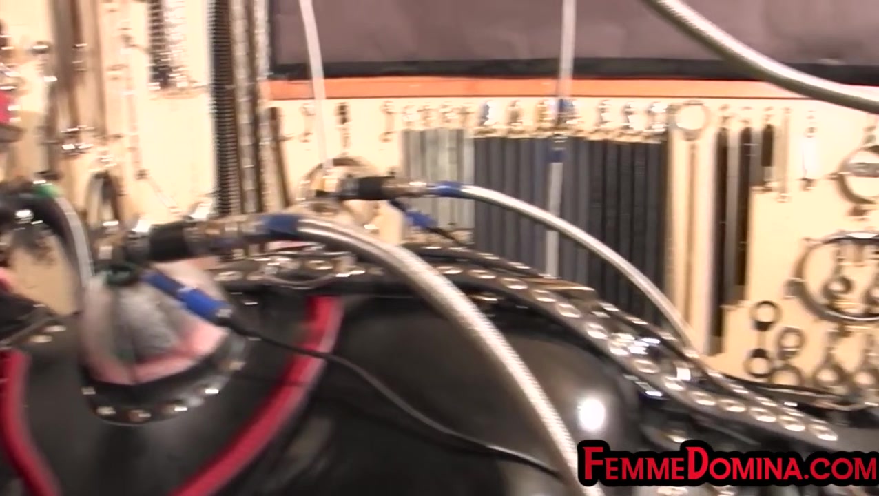 Femdom BDSM latex domina torments sub with cock pump