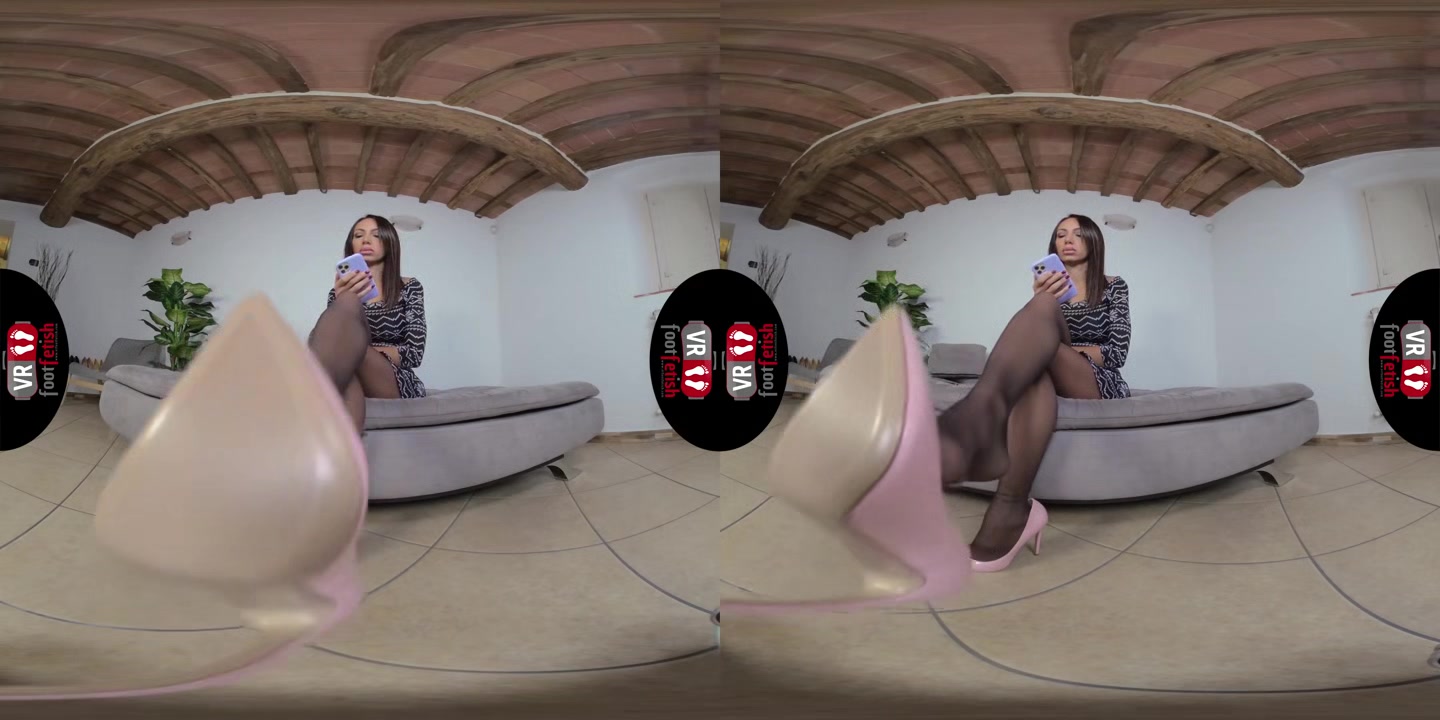 Stunningly Beautiful Daniela Lets Her Pink Stilettos Dangle Off Her Feet - VRFootFetish