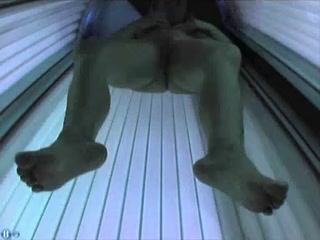 solarium, boob show