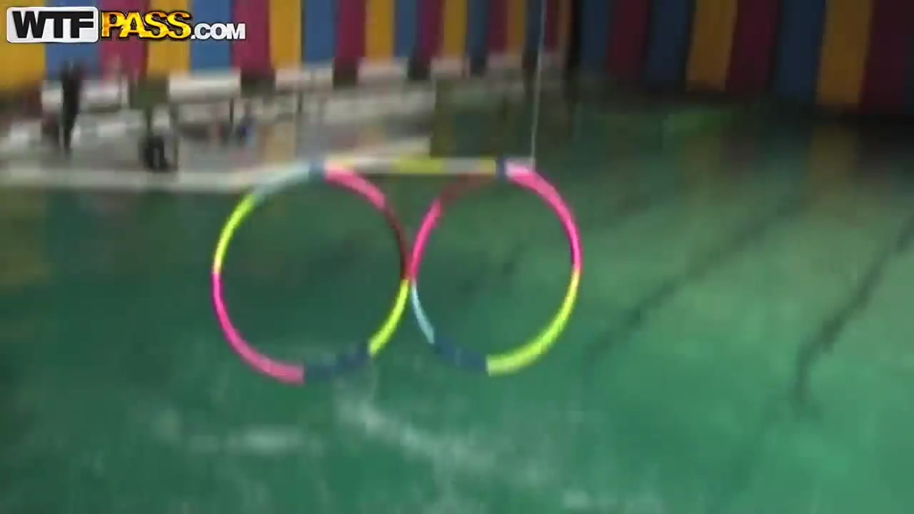 Cute and young brunette babe Natasha is getting seduced by her workmate at dolphinarium for naughty fuck.
