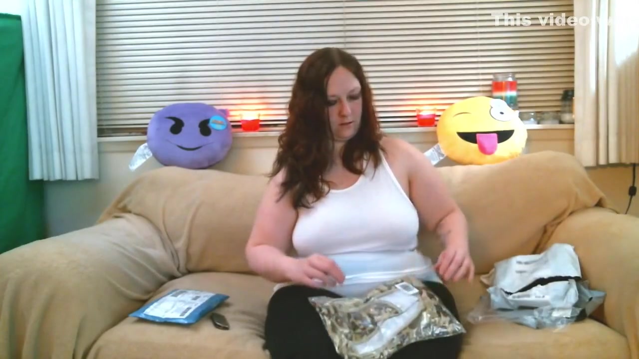 thick redhead tries on some clothes and shows off her ass and tight pussy
