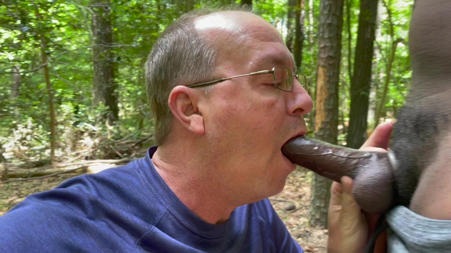 Brad sucks big black cocks in the woods