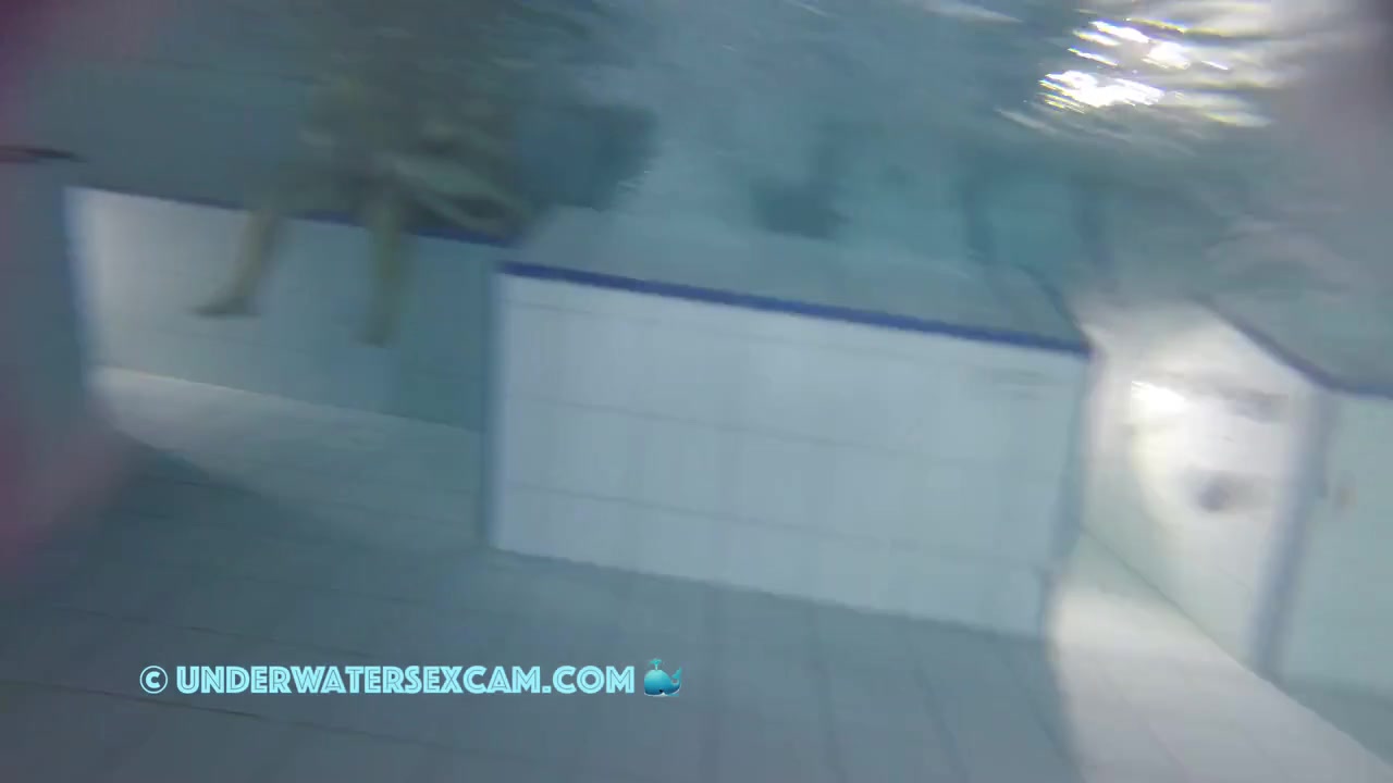 Sporty Couple Regenerating On An Underwater Bench