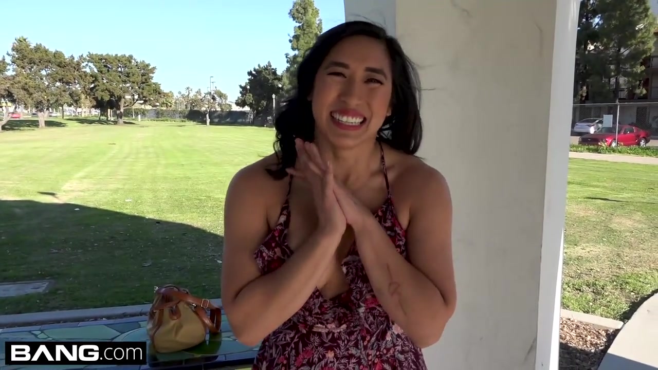 Mia Li shows off her bushy pussy in some upskirt action outside