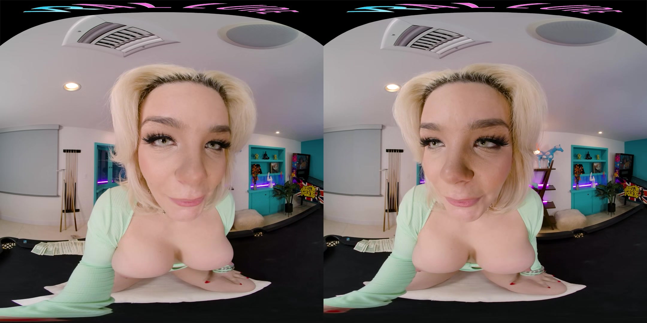 Seductive blonde with big boobs gives you a steamy show in VR