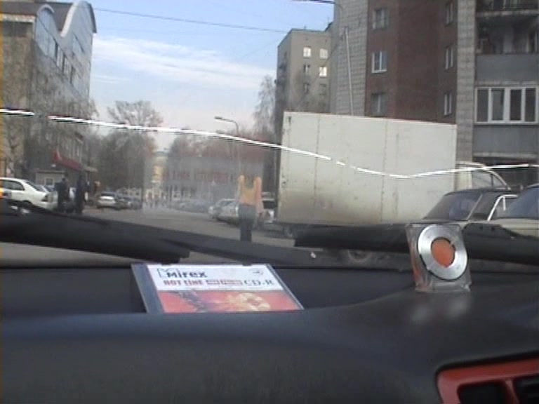 Busty girl gives head in the car