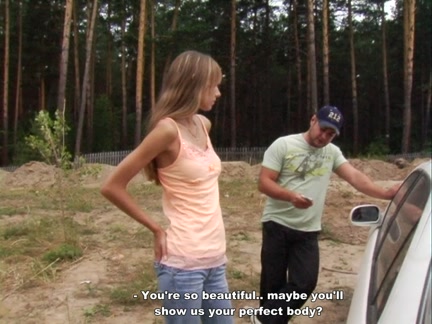 Youthful hotty showing breasts in the forest