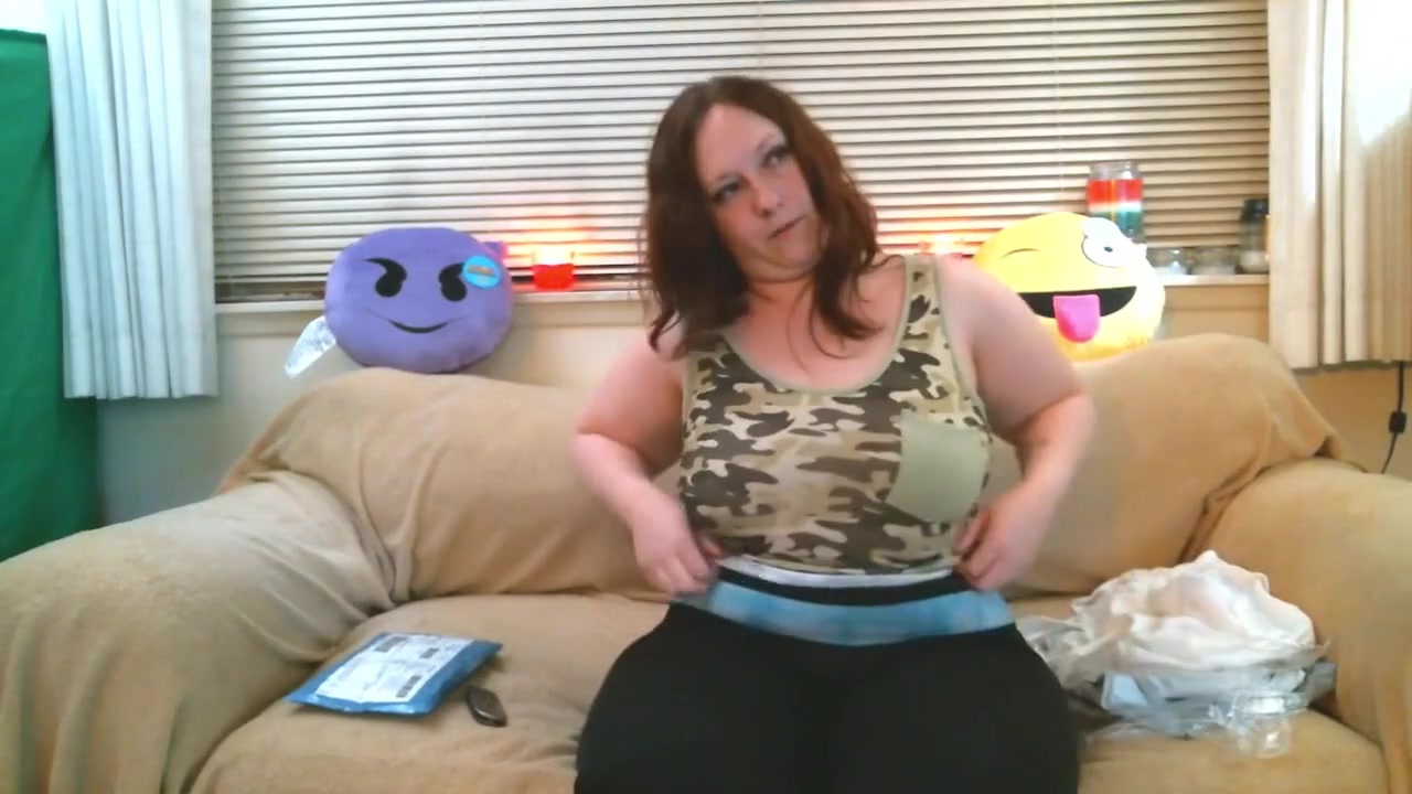 thick redhead tries on some clothes and shows off her ass and tight pussy