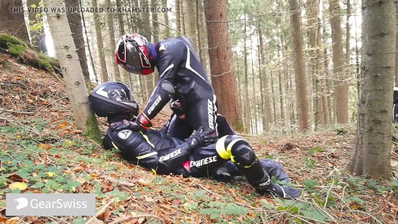 German dainese bikers having fun in the wood