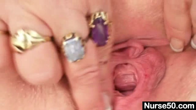 Mature BBW wife is fingering her fat pussy