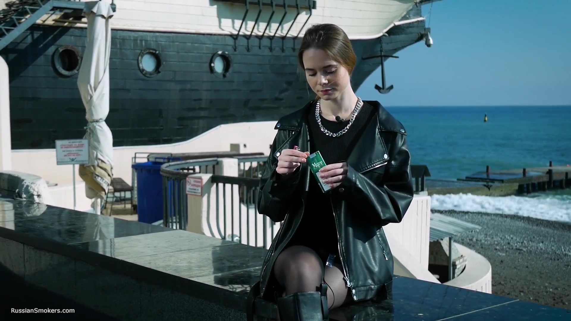 Smoking Strong Brown 120mm Cigarette Near The Beach