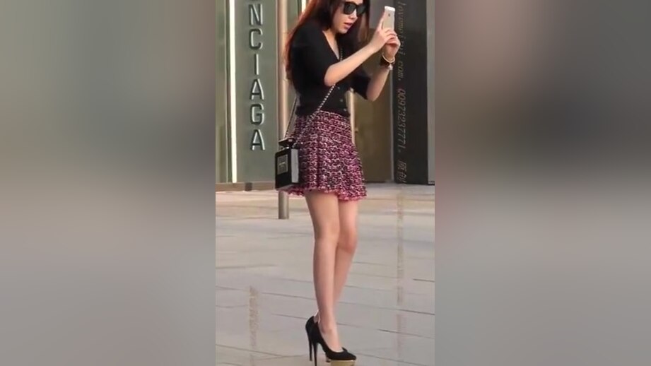 Chinese girl in short skirt