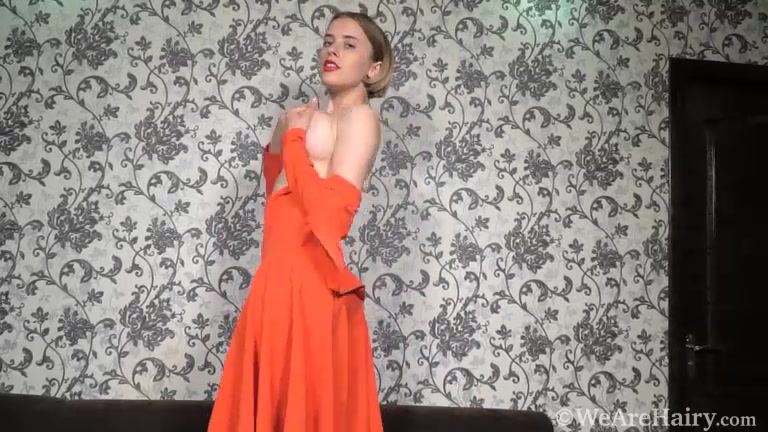 Anolia wears red as she masturbates on her couch - WeAreHairy