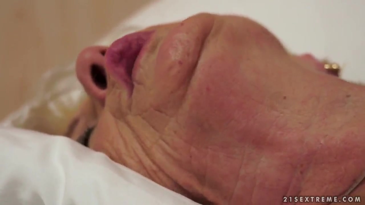 Blonde granny having sex with pretty stud