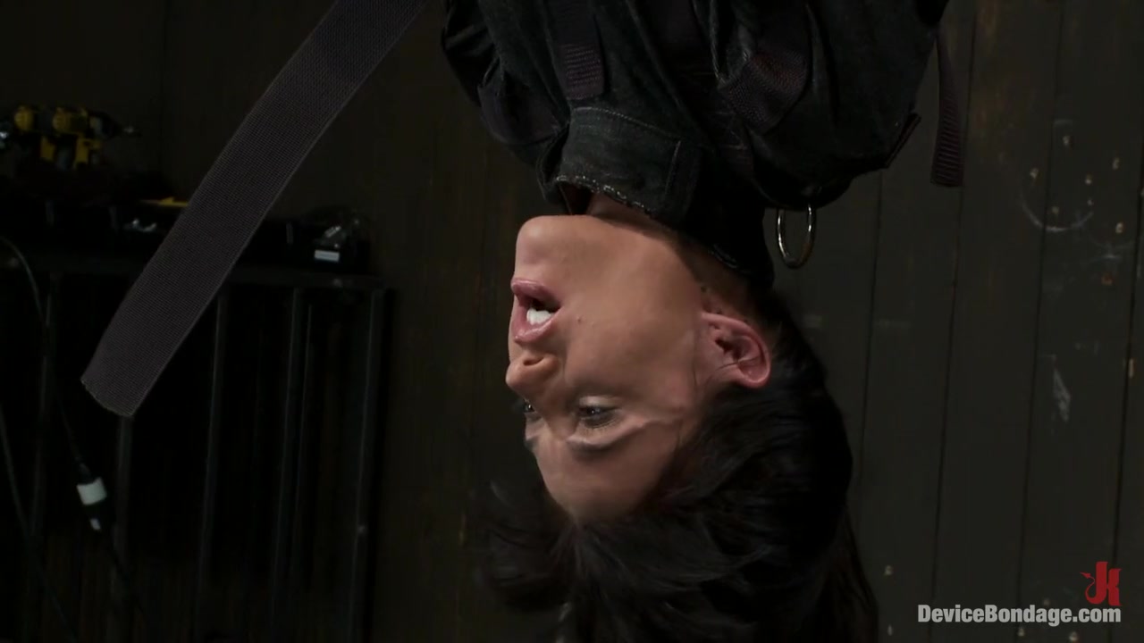 Bound in a straightjacket, inverted suspendedFucked by a machine, made to suck cock & zippered.
