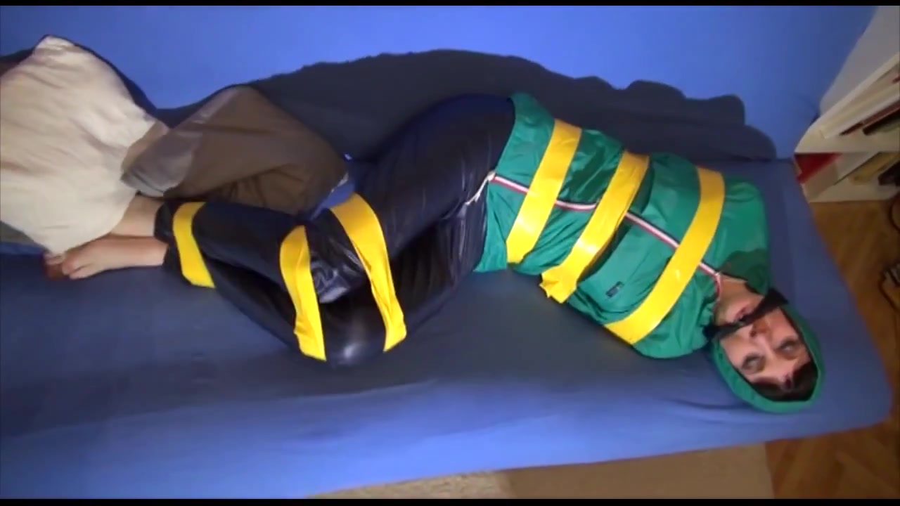 Get 2 Archive Videos With Mara Enjoying Bondage In Her Shiny Nylon Rainwear