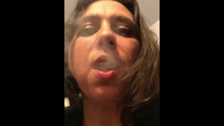 Italian Mistress smoking inhale