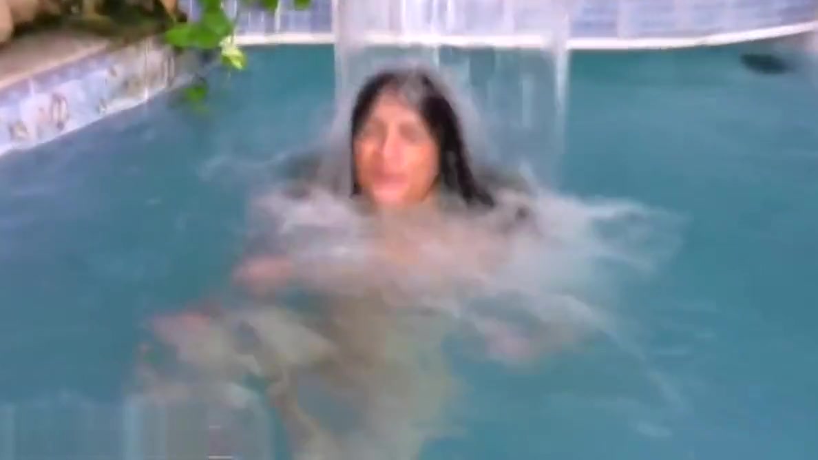 Big ass tranny plays with her massive penis in pool and cums