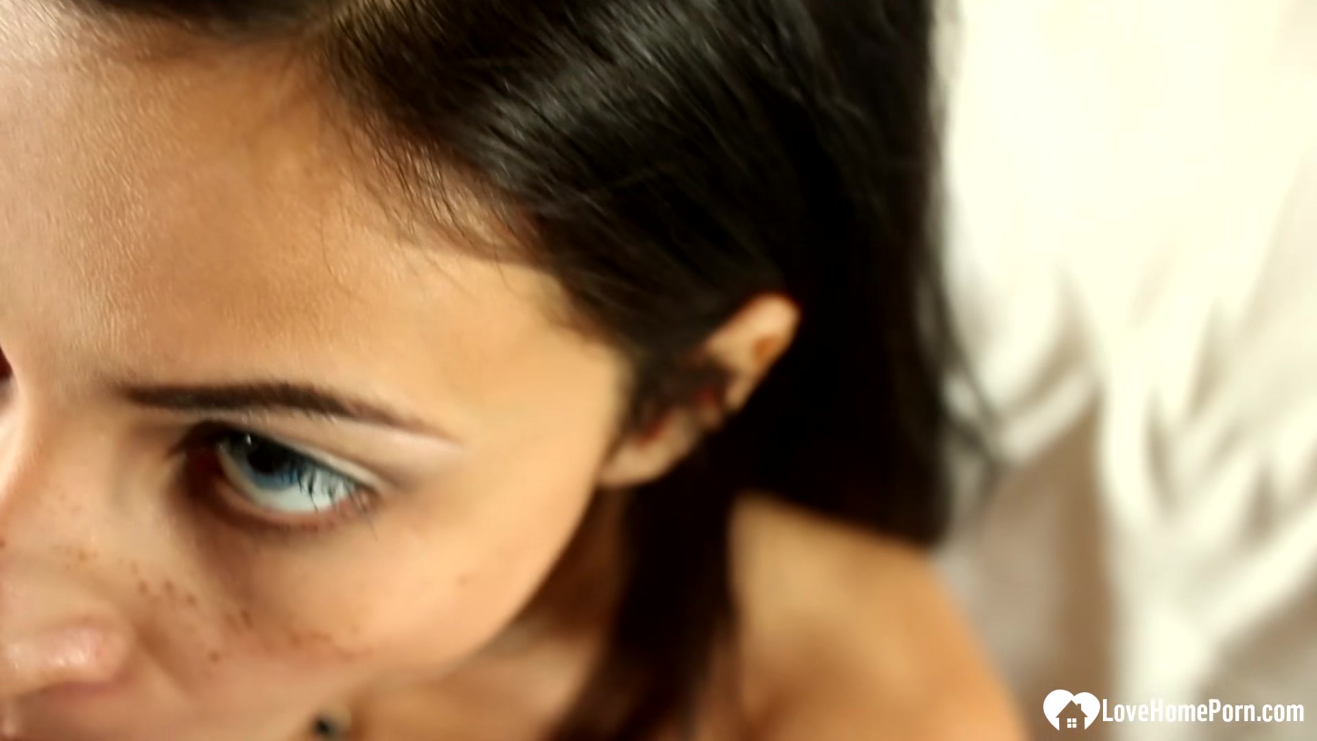 Smoking brunette wraps his lips around his cock