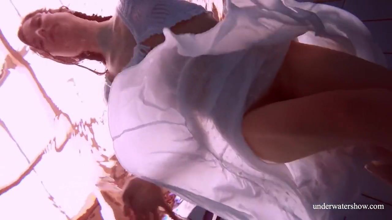 Redhead Marketa In A White Dress In The Pool