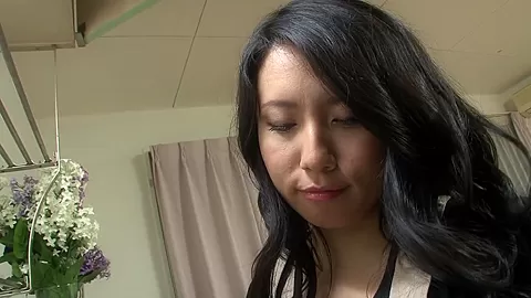 Chubby Japanese MILF masturbates while a horny dude is catching on her by Solo Japanese