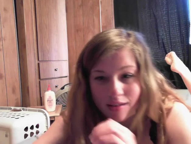 Blonde chick with big tits spreading her pussy lips wide