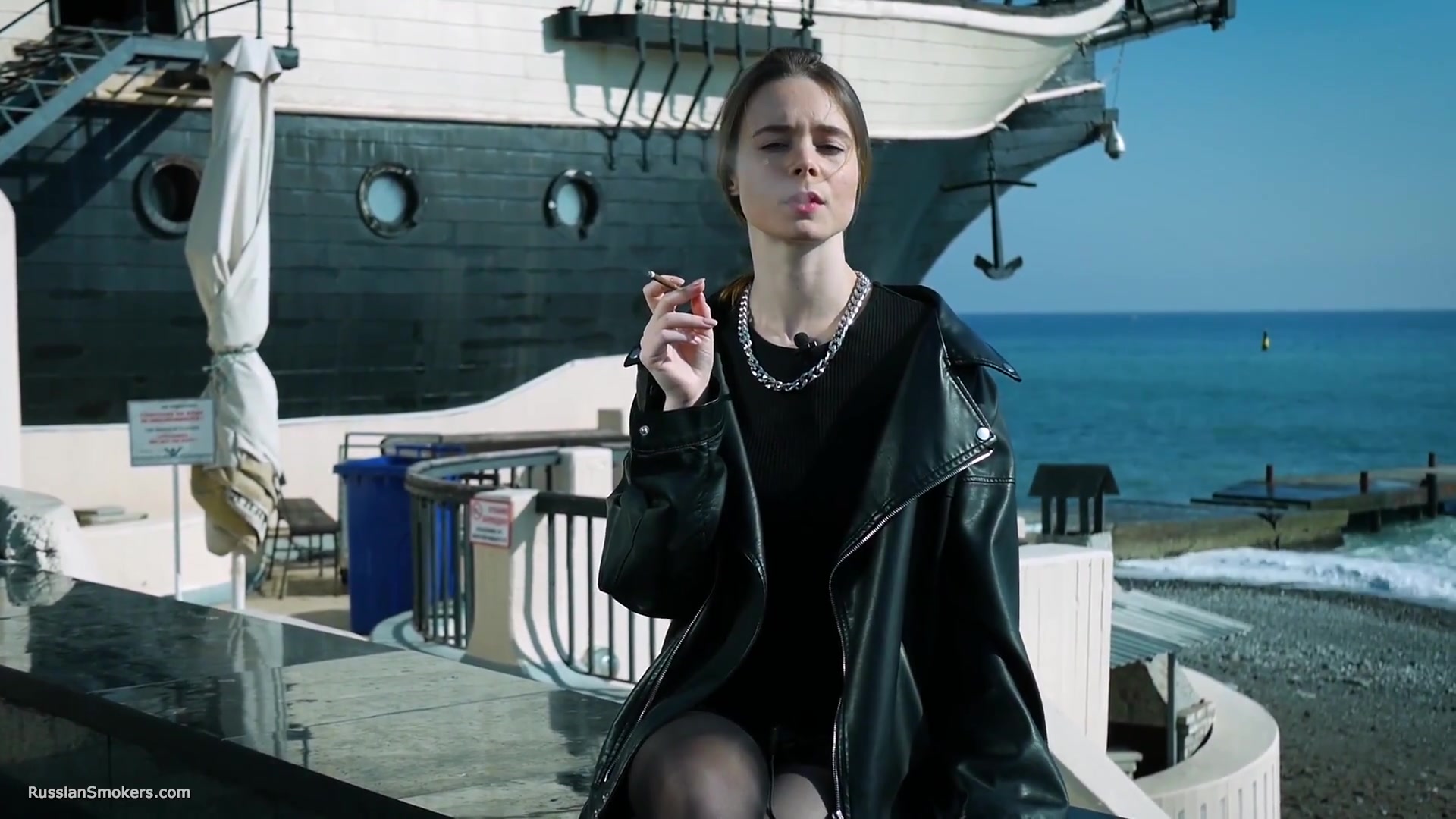 Smoking Strong Brown 120mm Cigarette Near The Beach