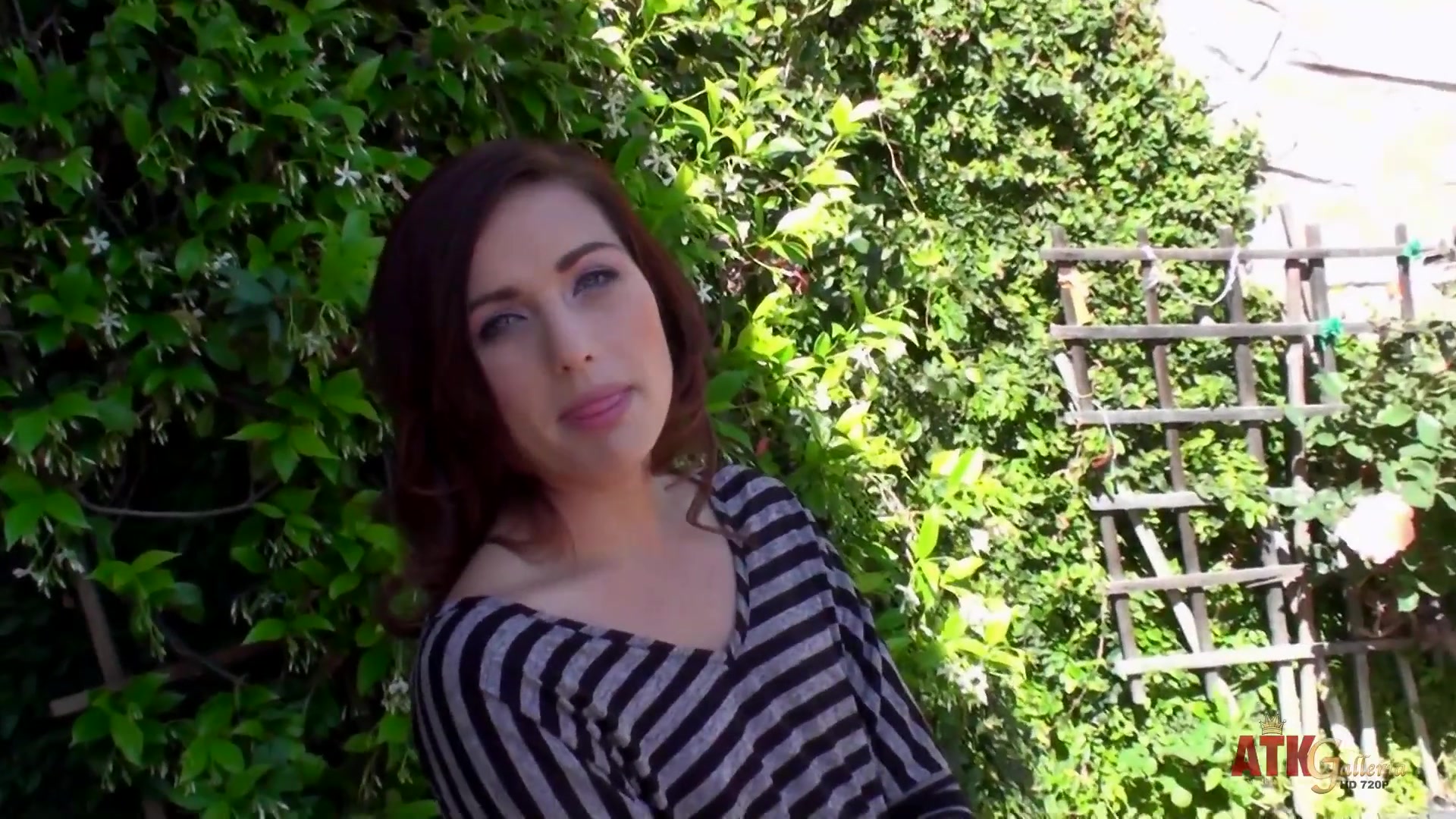 Sweet Maryjane Johnson smoking a cigarette and showing her small tits