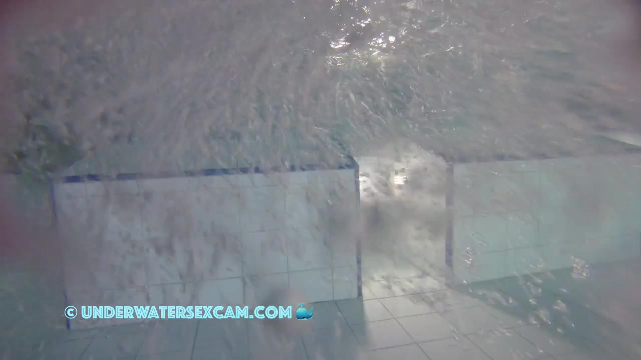 Sporty Couple Regenerating On An Underwater Bench