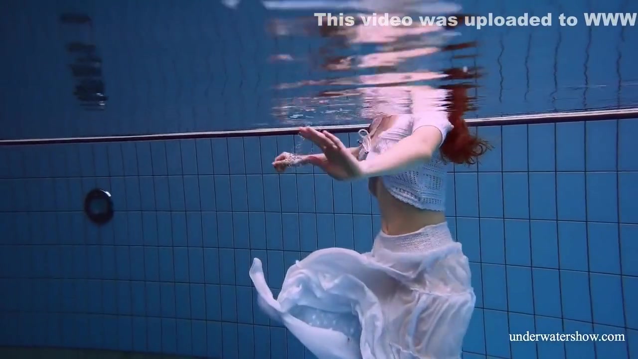 Redhead Marketa In A White Dress In The Pool