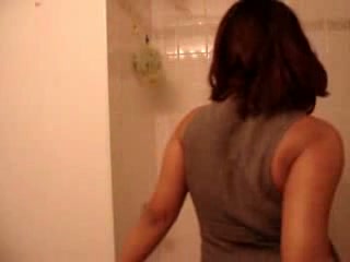 Black BBW in bathroom stripping and dancing