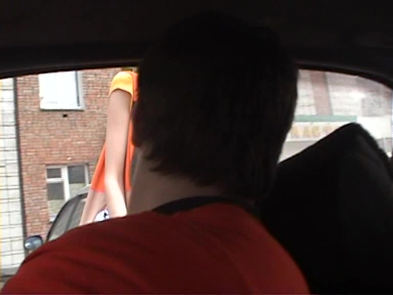 Busty girl gives head in the car