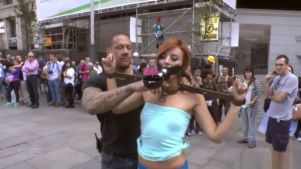 Naked ginger slave led through Madrid