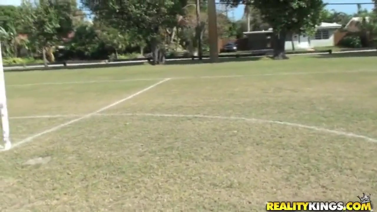Molly Cavalli and Tiffany Tyler play football