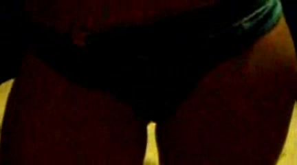 Young bitch showing her shaved pussy and big tits on camera