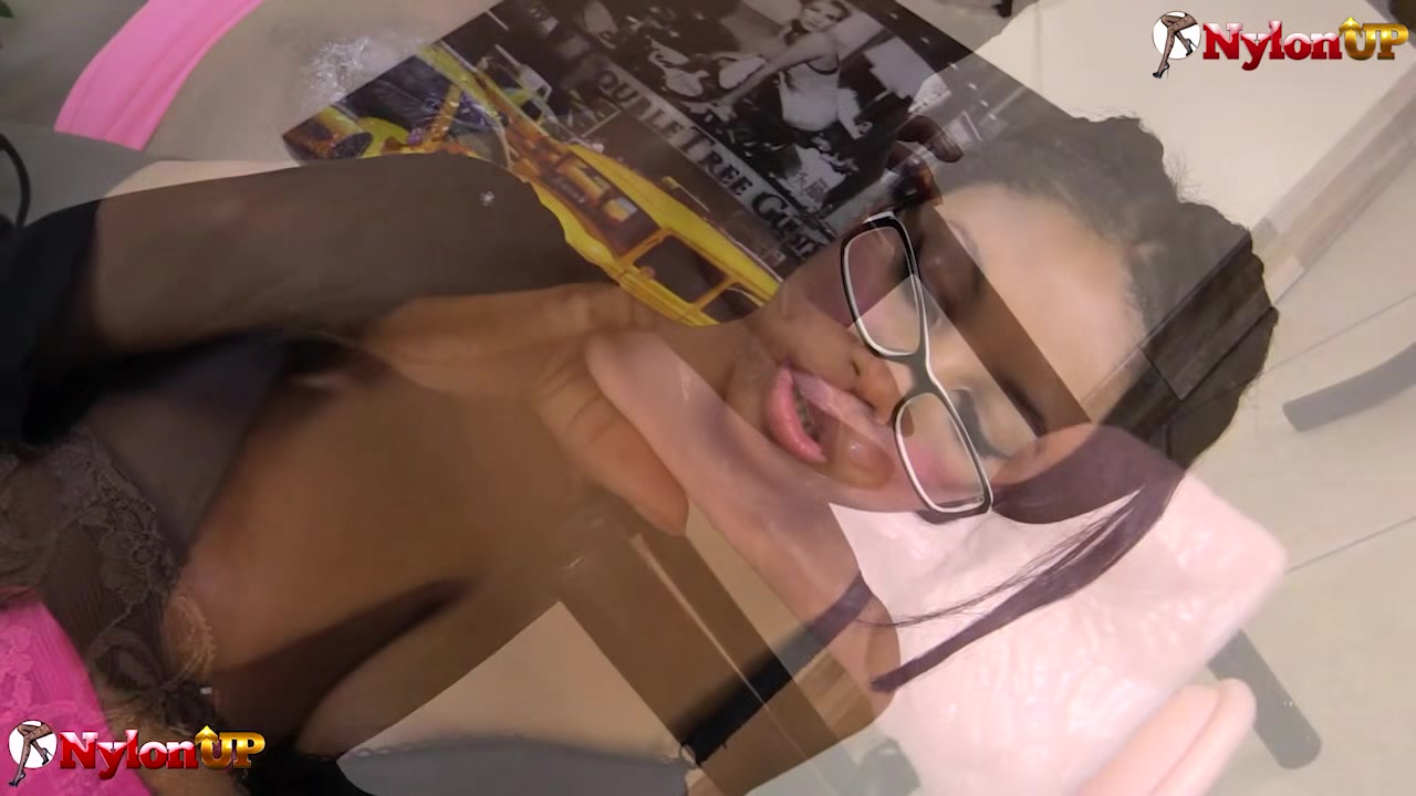 Black girl in stockings ride a dildo,provides footjob to it
