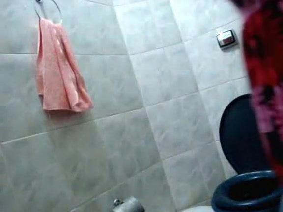Hot Latina Strips in the Bathroom