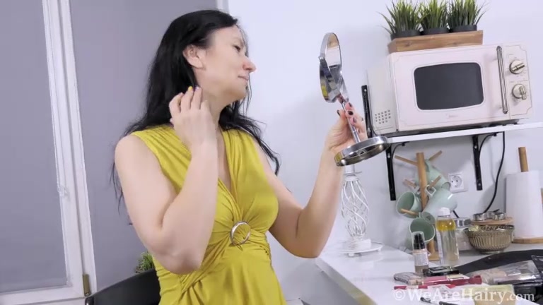 Isadora masturbates after putting on her makeup