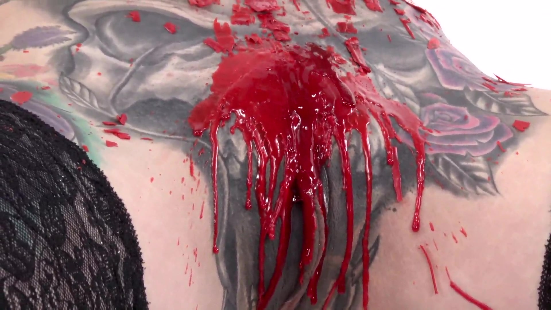 Tattooed Fetish Model Marie Bossette Playing With Candle Wax