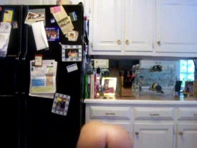 Young busty chick strips in the kitchen, where she belongs